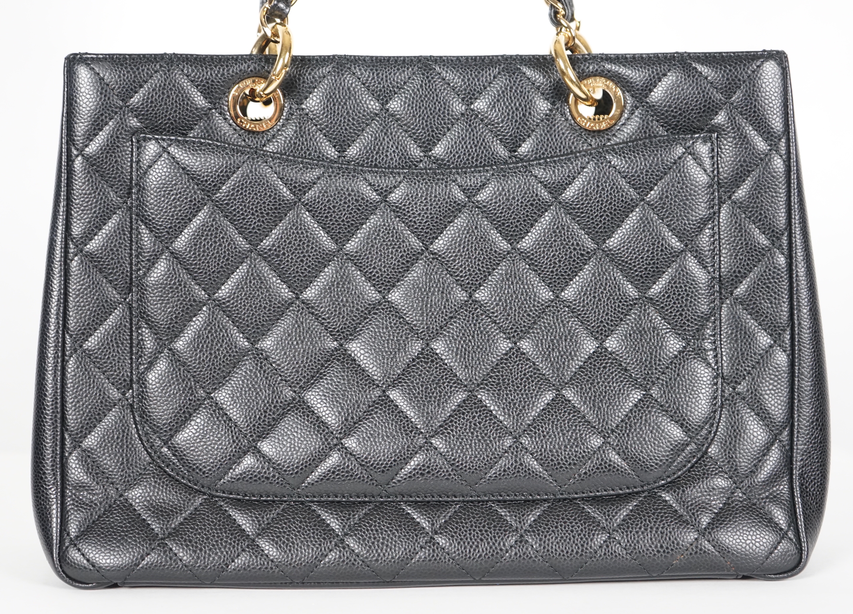 A Chanel vintage black quilted Caviar Timeless Grand Shopping Tote, width 34.5cm, height 25cm, height overall 47cm, depth 13cm, Please note this lot attracts an additional import tax of 20% on the hammer price